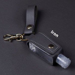 Keychain with hand sanitizer empty plastic bottle